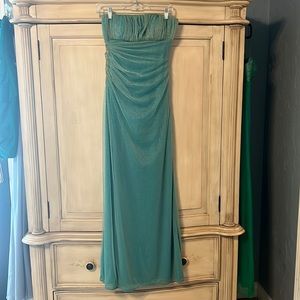 Teal strapless dress. Cutouts on the side.